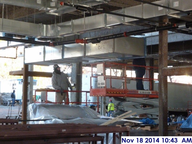 Continued installing duct work at the 1st floor Facing North
